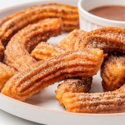 homemade churros on a platter